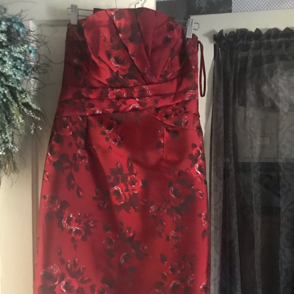Red floral strapless cocktail dress.